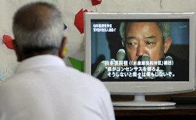 Man at evacuation center in Rikuzentakata