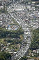 Japan's Golden Week holiday travelers flood roads, train stations