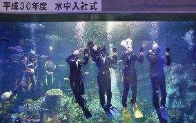 Welcome ceremony for new employees at Japanese aquarium