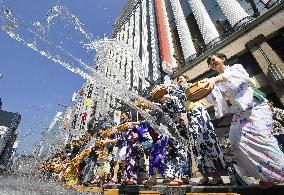 Water throwing in Ginza