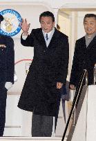 Aso heads to Washington for talks with Obama