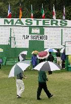 Masters temporarily suspended due to bad weather