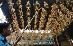 Spiral-shaped incense at temple in Vietnam