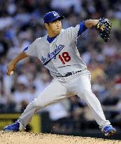 Los Angeles' Kuroda strikes out 9 in 2nd win