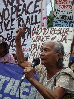 Former "comfort women" protest over Philippines-Japan military deal