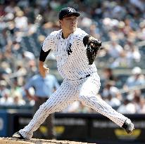 Tanaka earns 9th win as Yankees outslug Rays