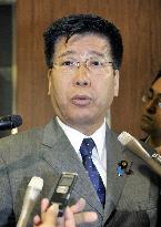 LDP lawmaker throws water at Foreign Ministry official