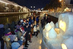 Otaru canal illuminated by candlelight