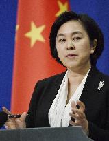 China urges resolution of Syrian issue by political means