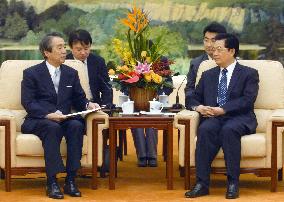Japan's LDP Secretary General Ibuki talks with Hu Jintao