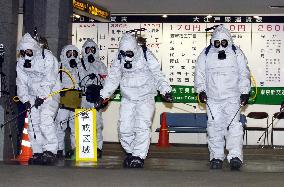 Tokyo police hold chemical attack drill in subway station