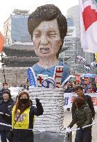 Protesters make likeness mocking South Korean president