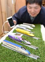 Shinkansen-shaped mobile battery charger selling well