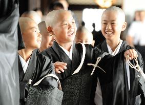 Children become Buddhist priests