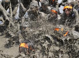 Muddy sports event in Japan