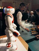 Robot shows up in mock casino at theme park in Japan