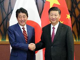 Japan's Abe, China's Xi meet over bilateral ties, N. Korea