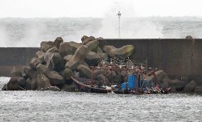 Men found on boat in northeast Japan say they came from N. Korea