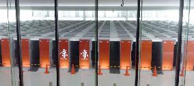 Typhoon halts operation of Japanese supercomputer K