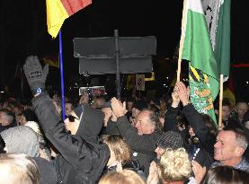 Protest against German Chancellor Merkel