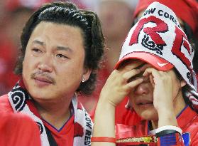 South Korea supporters shocked by team's defeat