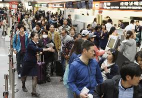 System trouble grounds JAL's domestic flights, affects travelers