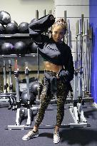 Six-pack queen goes full burn to revolutionize fitness in Japan