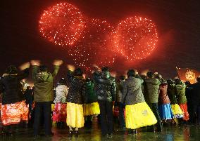 N. Korea celebrates rocket launch with dance party, fireworks