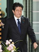 Abe hopes summit with Putin opens door for isles row progress