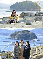 Families in tsunami-hit town then and now