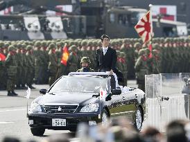 Japan PM pitches SDF's new overseas duties at review ceremony