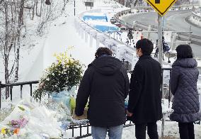 Japan marks 1st anniversary of deadly ski tour bus crash