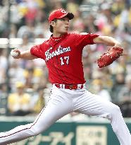 Baseball: Okada goes distance as Carp beat Tigers