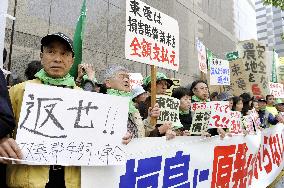 Farmers protest TEPCO