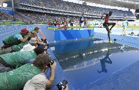 Olympics: Scenes from athletics competition on Day 13