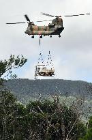 SDF helicopters airlift equipment to build U.S. helipads in Okinawa