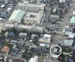 Man attacks police box, steals gun in central Japan