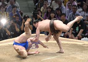 Sumo: Yokozuna Hakuho wins on opening day of Nagoya sumo