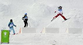 Japanese freestyle skiers practice at Olympic venue