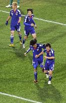 Japan overpower Denmark to cruise into last 16