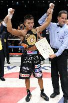 Uchiyama defends super featherweight title