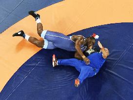 Olympic scenes: Cuban wrestler throws coach