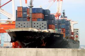 Filipino container ship after collision with U.S. destroyer