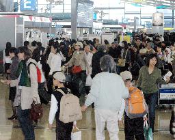 Golden Week exodus begins