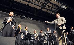 Japanese students' brass band performs for Calif. shooting victims