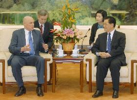 U.S. Treasury Secretary Paulson talks with Chinese President Hu