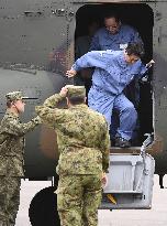 PM Abe takes helicopter tour over typhoon-damaged area