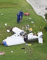 Small aircraft crashes into golf course in Hyogo