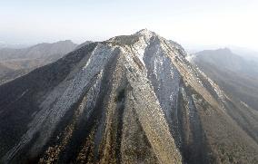 Mt. Daisen covered with season's 1st snow