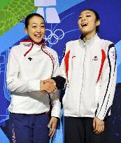 Asada, Kim attend press conference after women's short program